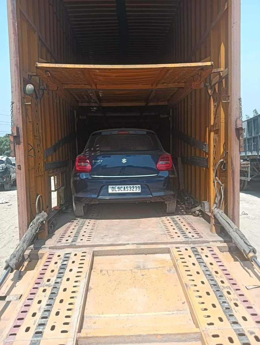 Car loaded inside an enclosed carrier