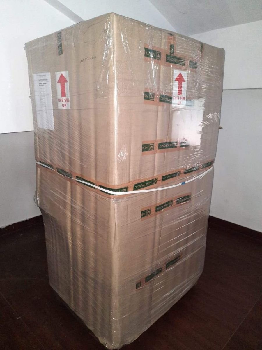 Refrigerator wrapped and packed