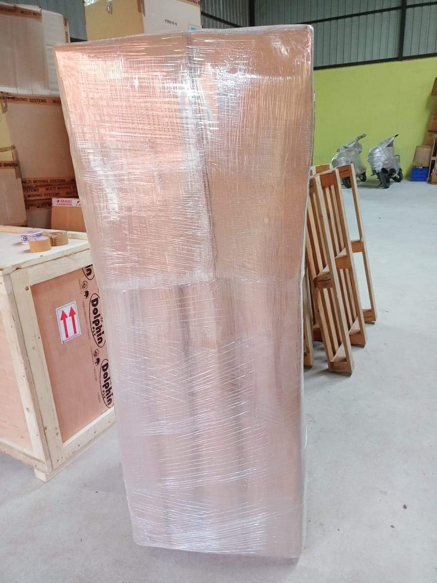 Tall wardrobe stretch-wrapped